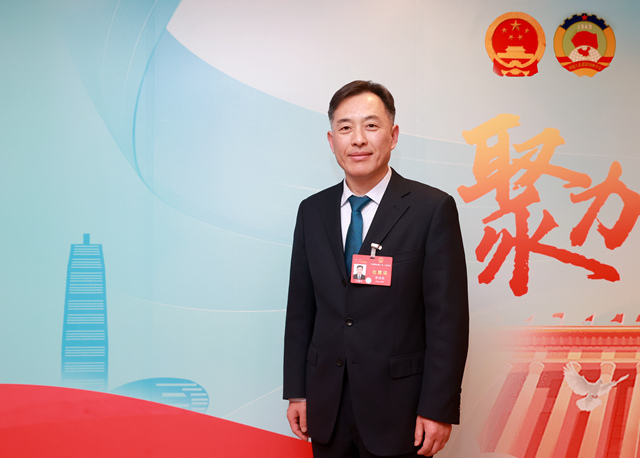 全國人大代表、河南農業大學黨委書記李成偉。受訪者供圖